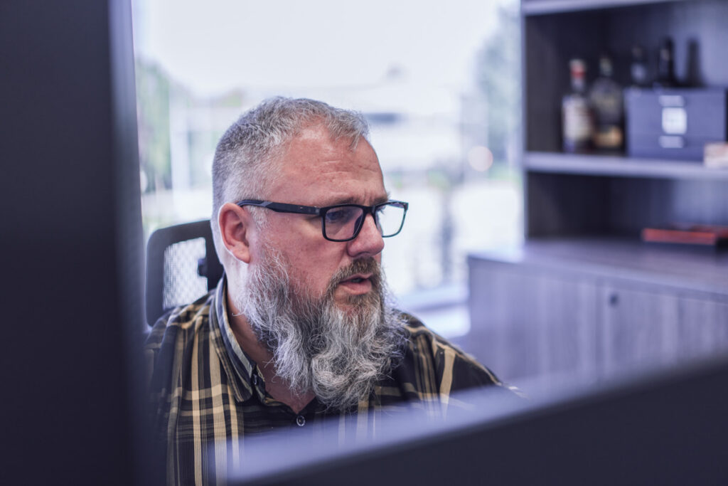 An employee working at their computer