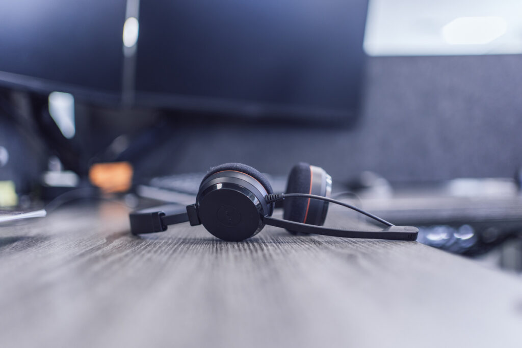 Headphones laying on a work desk