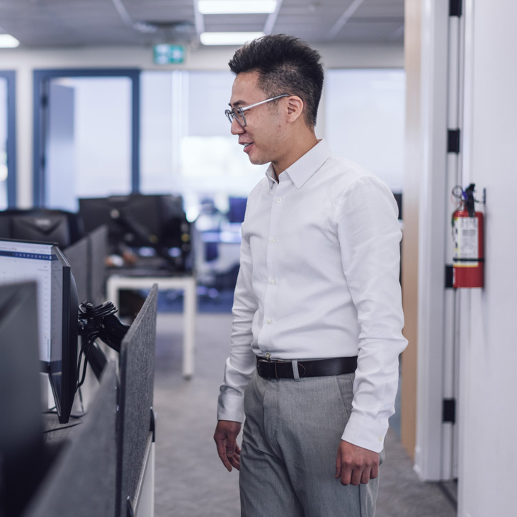 An employee standing in the hallway